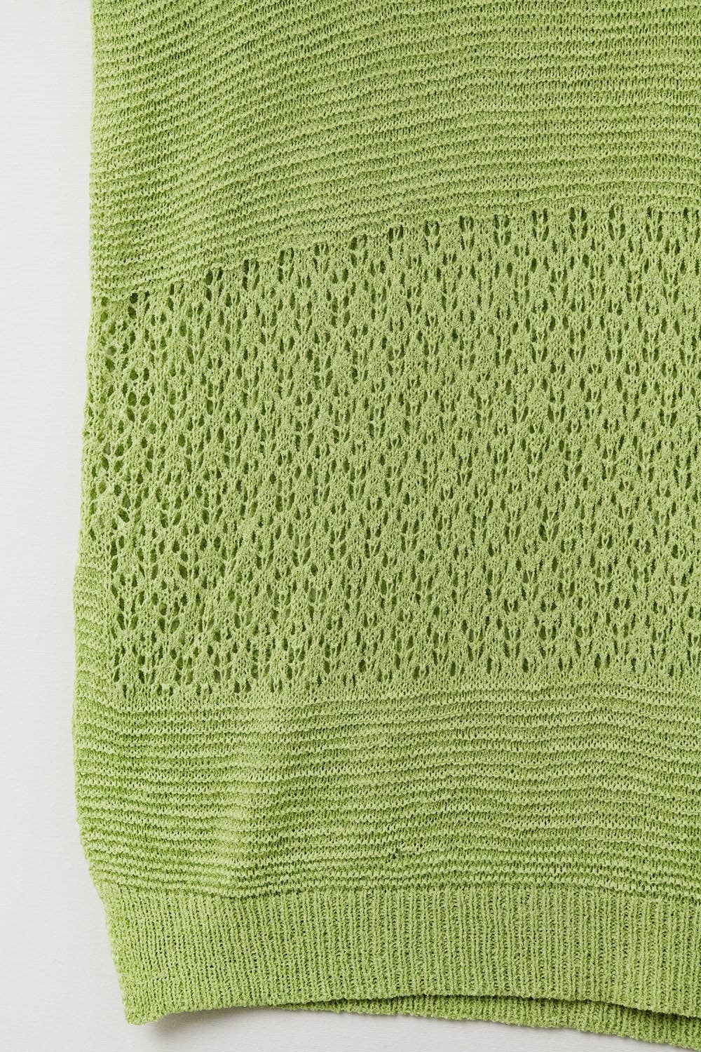 Q2 Green sweater with soft open knit and dropped sleeves